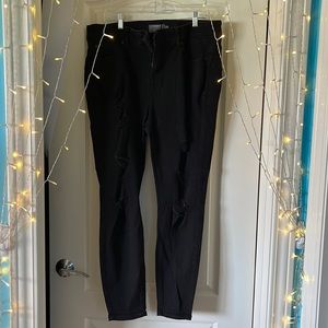 TORRID black ripped skinny jeans